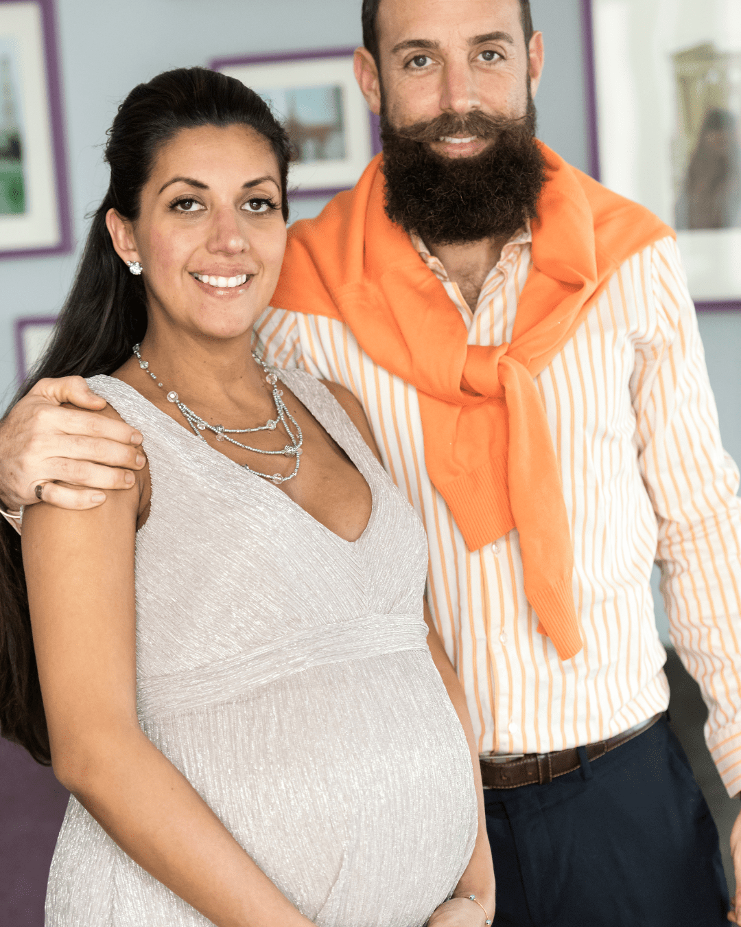 Pregnant couple orange jumper- sonogram